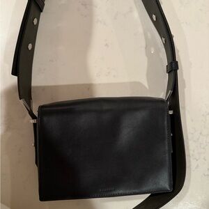 All Saints Black Crossbody Bag with Adjustable Strap and Minimalist Design